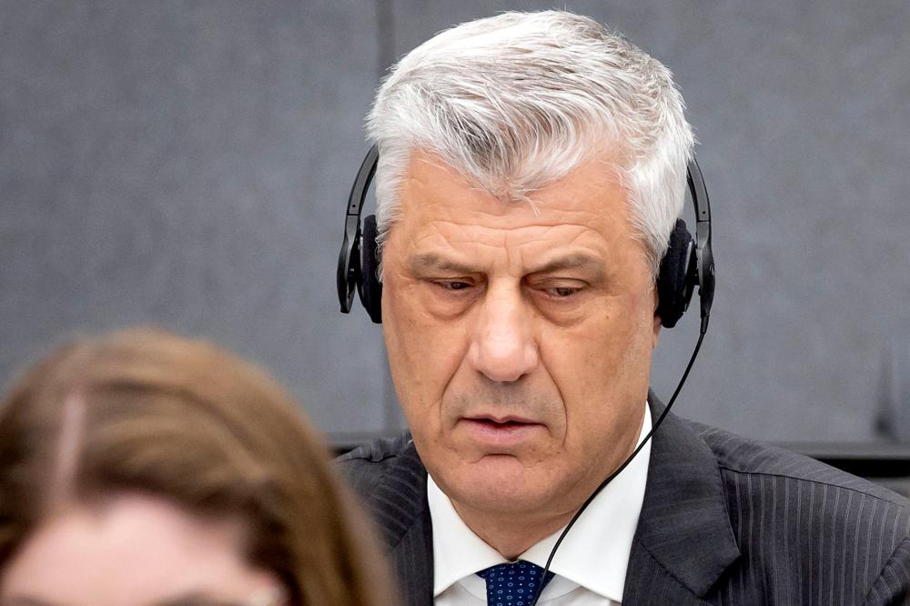 Former Kosovo president Hashim Thaci sits in court as he appears on charges of war crimes before the Kosovo Tribunal in The Hague on April 3, 2023. AFPPIX