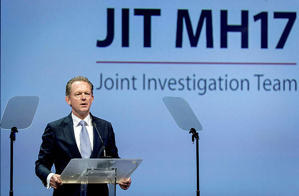 Filepix taken on June 19 shows Fred Westerbeke of the Joint Investigation Team (JIT) addresses at the JIT press conference on the ongoing investigation of the Malaysia Airlines MH17 at Nieuwegein, Netherlands.
