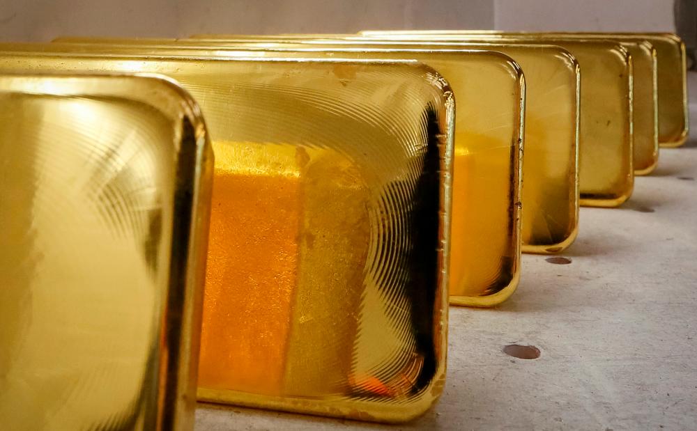 Newly cast ingots of 99.99% pure gold are stored after weighing at the Krastsvetmet non-ferrous metals plant, one of the world's largest producers in the precious metals industry, in the Siberian city of Krasnoyarsk, Russia. – REUTERSPIX
