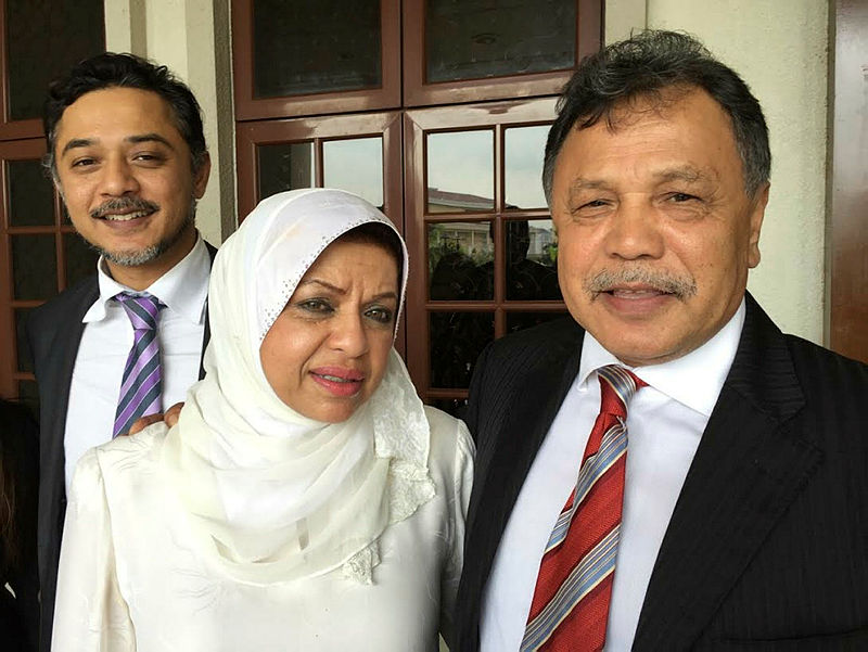 Filepix of NFCorp director Datuk Seri Dr Mohamad Salleh Ismail (R) and his wife Tan Sri Shahrizat Abdul Jalil (C), in this picture taken on Nov 24, 2015. — Bernama