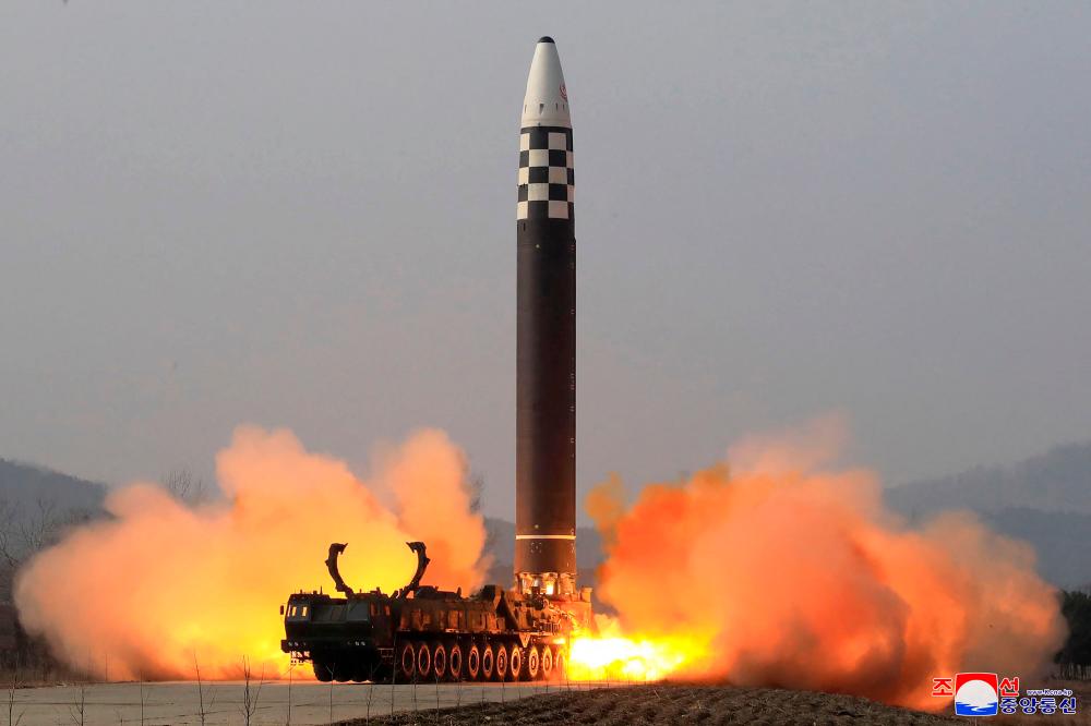 This picture taken on March 24, 2022 and released from North Korea's official Korean Central News Agency (KCNA) on March 25, 2022 shows the test launch of what state media reports a new type inter-continental ballistic missile (ICBM), the Hwasongpho-17 of North Korea's strategic forces in an undisclosed location in North Korea. AFPPIX