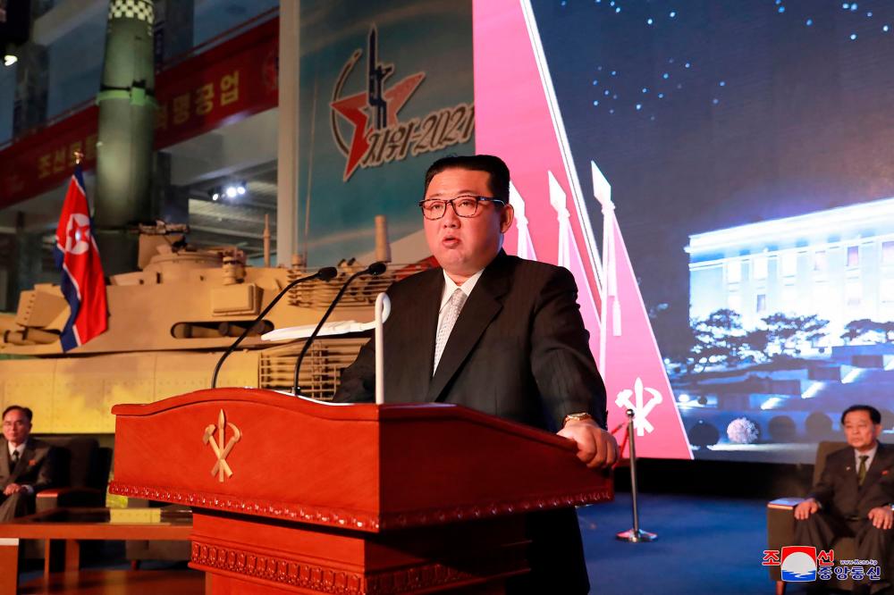 This picture taken on October 11, 2021 and released from North Korea’s official Korean Central News Agency (KCNA) on October 12 shows North Korean leader Kim Jong Un giving a speech during the opening ceremony of The Defence Development Exhibition “Self-Defence-2021” in Pyongyang. AFPpix