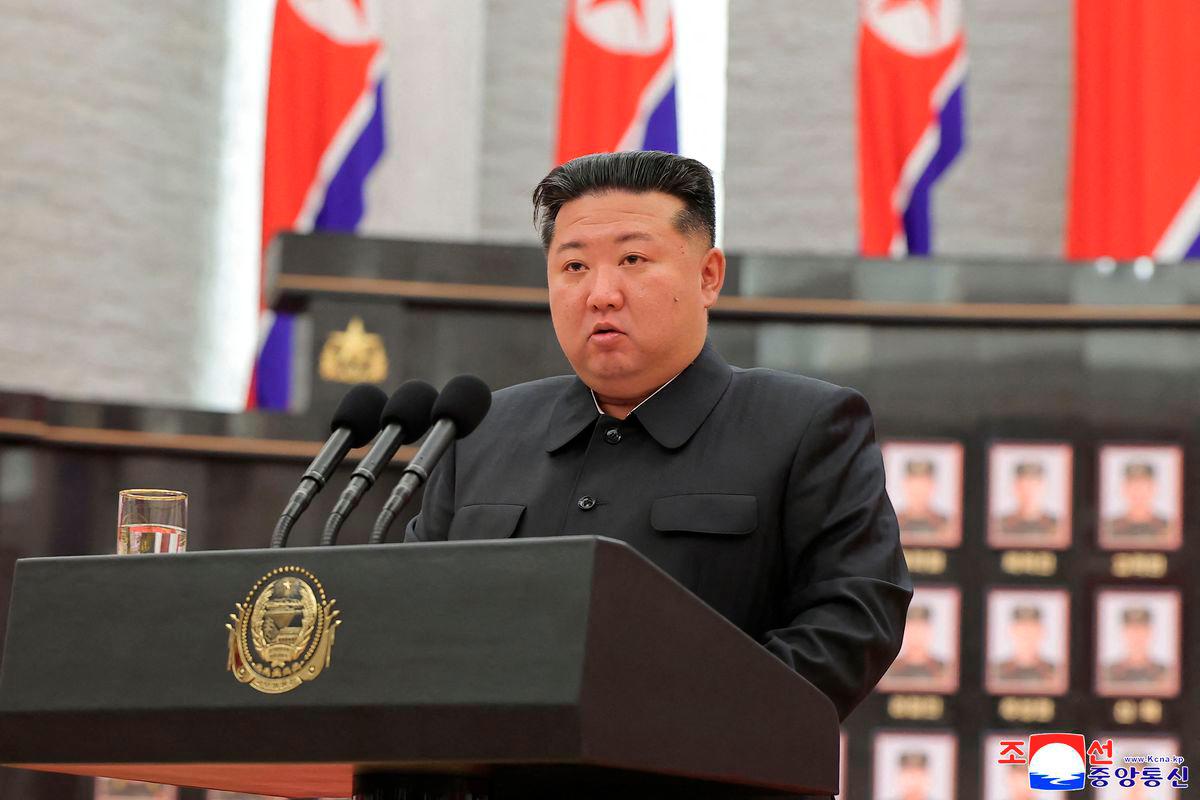 This undated picture released from North Korea's official Korean Central News Agency (KCNA) on August 22, 2025 shows North Korean leader Kim Jong Un speaking during a ceremony to award state commendations to the commander and combatants of the Korean People's Army's Overseas Operational Forces, who took part in military operations in Kursk Oblast of western Russia, at the headquarters building of the Central Committee of the The Workers' Party of Korea (WPK) in Pyongyang. - AFP PHOTO/KCNA VIA KNS