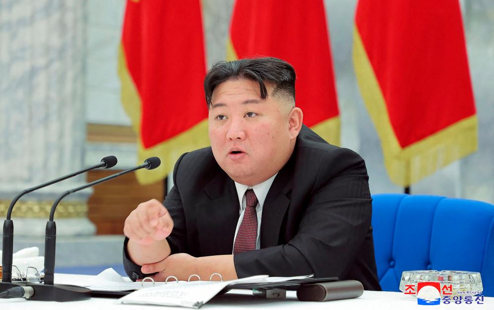 This picture taken on December 30, 2022 and released from North Korea’s official Korean Central News Agency (KCNA) on December 31, 2022 shows North Korea’s leader Kim Jong Un attending the 12th Politburo meeting of the 8th term of the Workers Party of Korea at the Party Central Committee in Pyongyang. AFPPIX