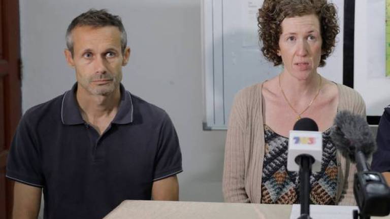 Filepix taken on Aug 12 shows Sebastien Marie Philipe and Meabh Jaseprine Quoirin, the parents of 15-year-old Nora Anne Quoirin who went missing, speaking during a news conference in Seremban. — Reuters