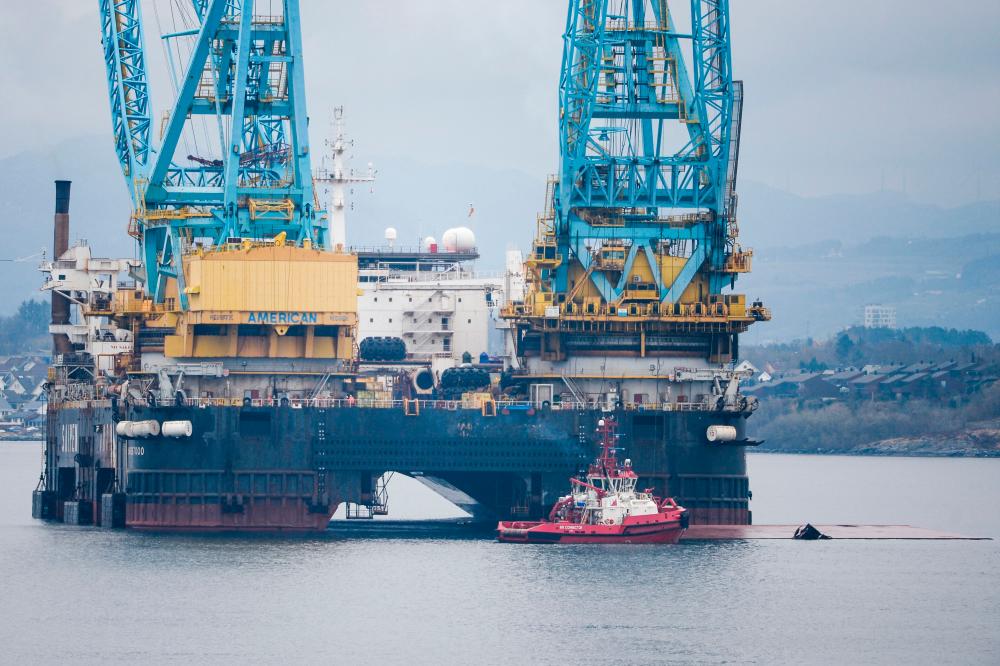 A semi-submersible crane vessel is pictured in the fjord outside Stavanger, south-western Norway, after it tilted due to the break of a steel wire during a lifting operation/AFPPix