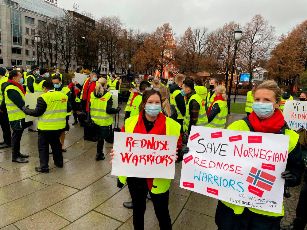 Norwegian Air crew staff demonstrating in front of the Norwegian Parliament to seek state support for the crisis-stricken airline, in Oslo o Wednesday. – REUTERSPIX