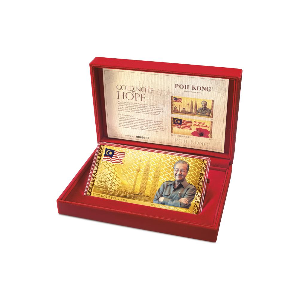 The gold note depicts an autographed portrait of Mahathir.