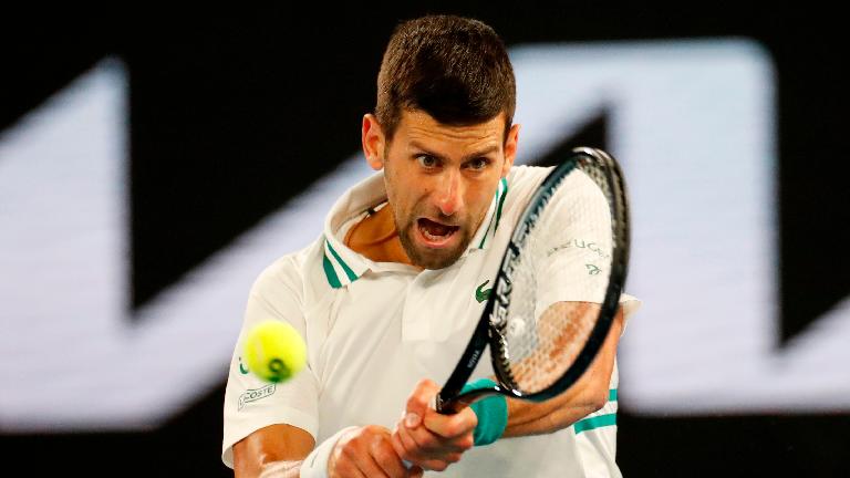 Djokovic overcomes 'strange' three-hour rain break to advance in Rome