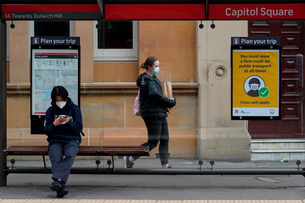 People wear protective face masks in the city centre during a lockdown to curb the spread of a coronavirus disease (Covid-19) outbreak in Sydney, Australia, September 28, 2021. REUTERSPix