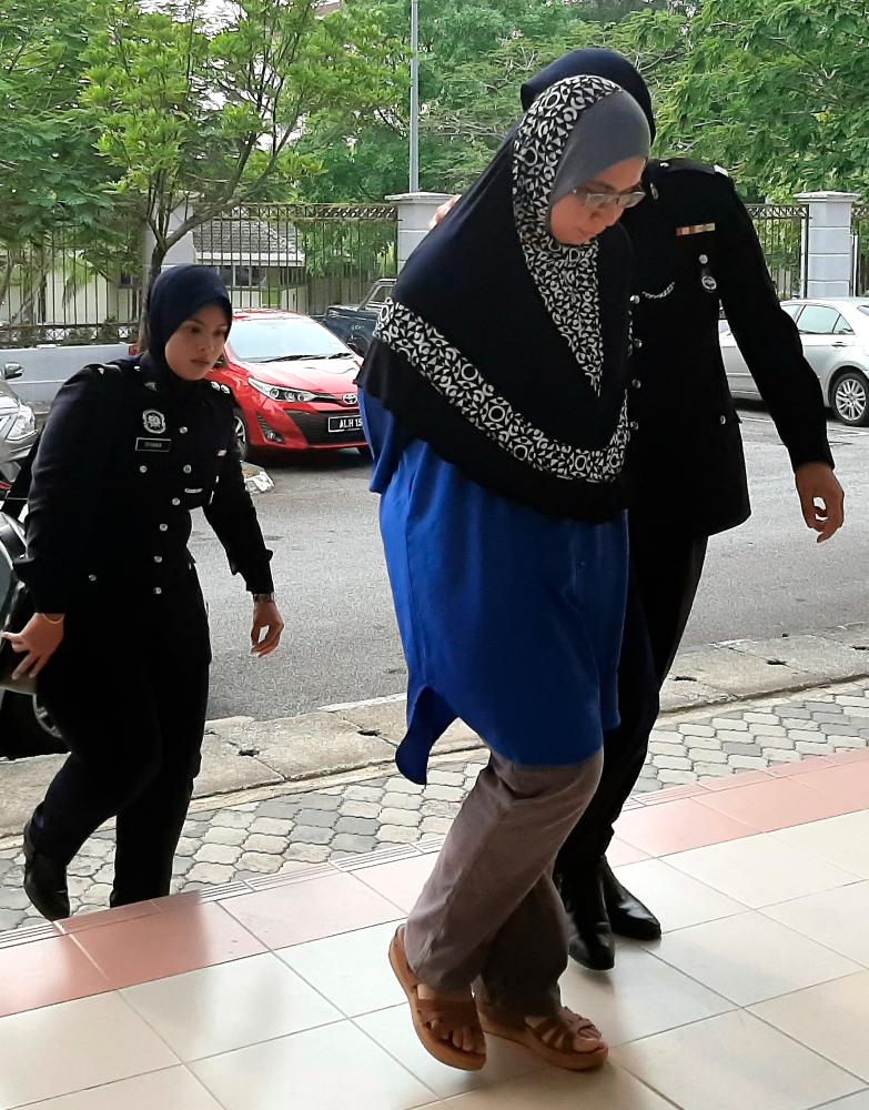 Manager of a cooperative company, Fazilawati Abdul Rahman, 42, pleaded not guilty in the Seremban sessions court today to a charge of criminal breach of trust. - Bernama