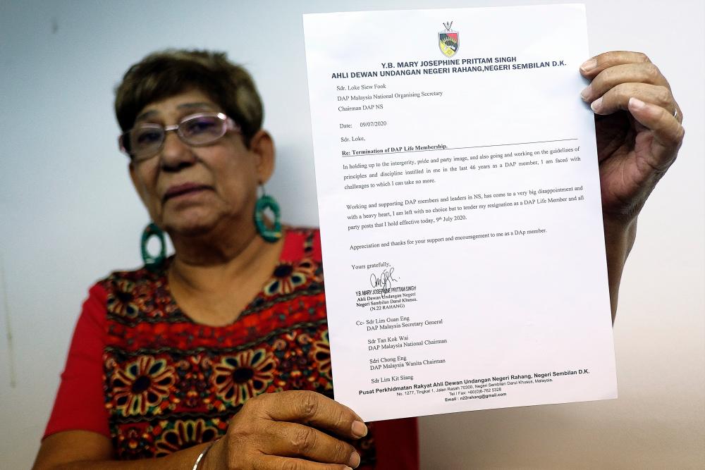 DAP's two-term Rahang assemblyman Mary Josephine Prittam Singh shows her resignation letter as DAP life member, as well as Negri Sembilan DAP committee member, at a special press conference today. - Bernama