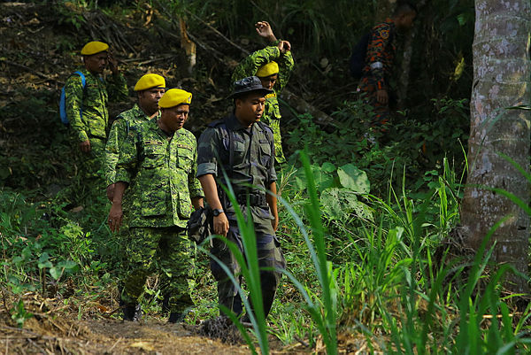 A SAR team carries out the search for missing Irish teenager, Nora Anne Quoirin, 15, who was reported missing Sunday around a forest area in Nilai, Seremban. — Bernama