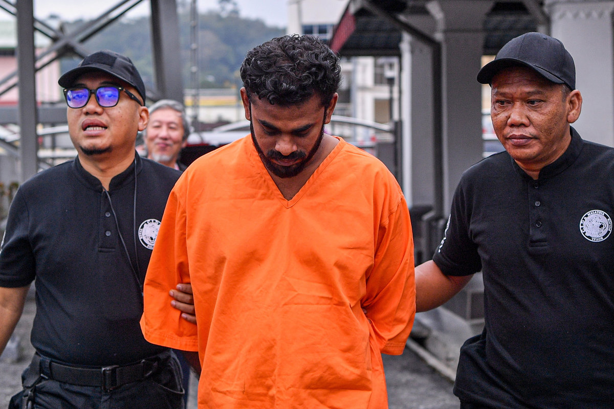 M. Arunkumar, 36, was charged in the Magistrate’s Court here today with the murder of his six-year-old son by the roadside at Kilometre 25 of Jalan Rompin, Bahau, last month. – BERNAMA
