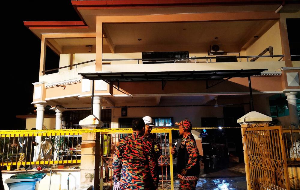 The house in Taman Desa Melati, Nilai where an elderly couple are believed to have been murdered, their bodies having been discovered after a fire on July 25, 2019. - Bernama