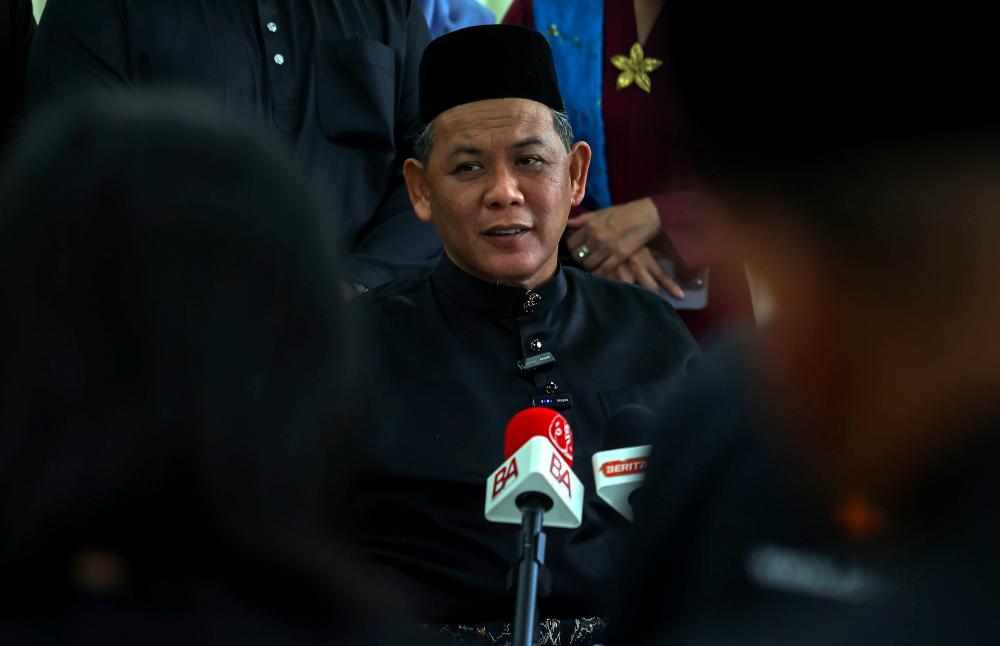 KUALA PILAH, 14 Ogos -- Menteri Besar Negeri Sembilan Datuk Seri Aminuddin Harun pada sidang media selepas selesai mengangkat sumpah Sebagai Menteri Besar Negeri Sembilan di Seri Menanti Resort hari ini. fotoBERNAMA