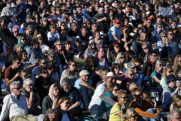 People attend a vigil in tribute to the victims of the twin mosques shootings Christchurch on March 24, 2019. — AFP