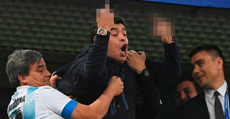Retired Argentina player Diego Maradona (centre) gestures during the Russia 2018 World Cup Group D football match between Nigeria and Argentina at the Saint Petersburg Stadium in Saint Petersburg on June 26, 2018. – AFPPIX/FILEPIX $!Retired Argentina player Diego Maradona (centre) gestures during the Russia 2018 World Cup Group D football match between Nigeria and Argentina at the Saint Petersburg Stadium in Saint Petersburg on June 26, 2018. – AFPPIX/FILEPIX