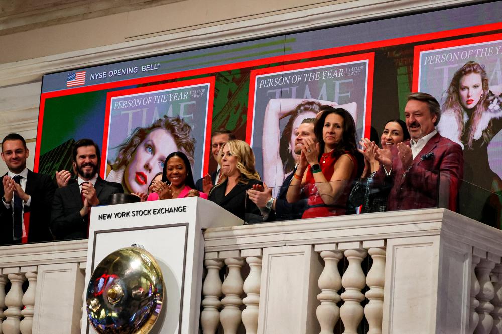 Jessica Sibley, CEO of TIME, rings the opening bell to celebrate the reveal of the 2023 TIME Person of the Year, Taylor Swift, at the New York Stock Exchange on Wednesday. – Reuterspic