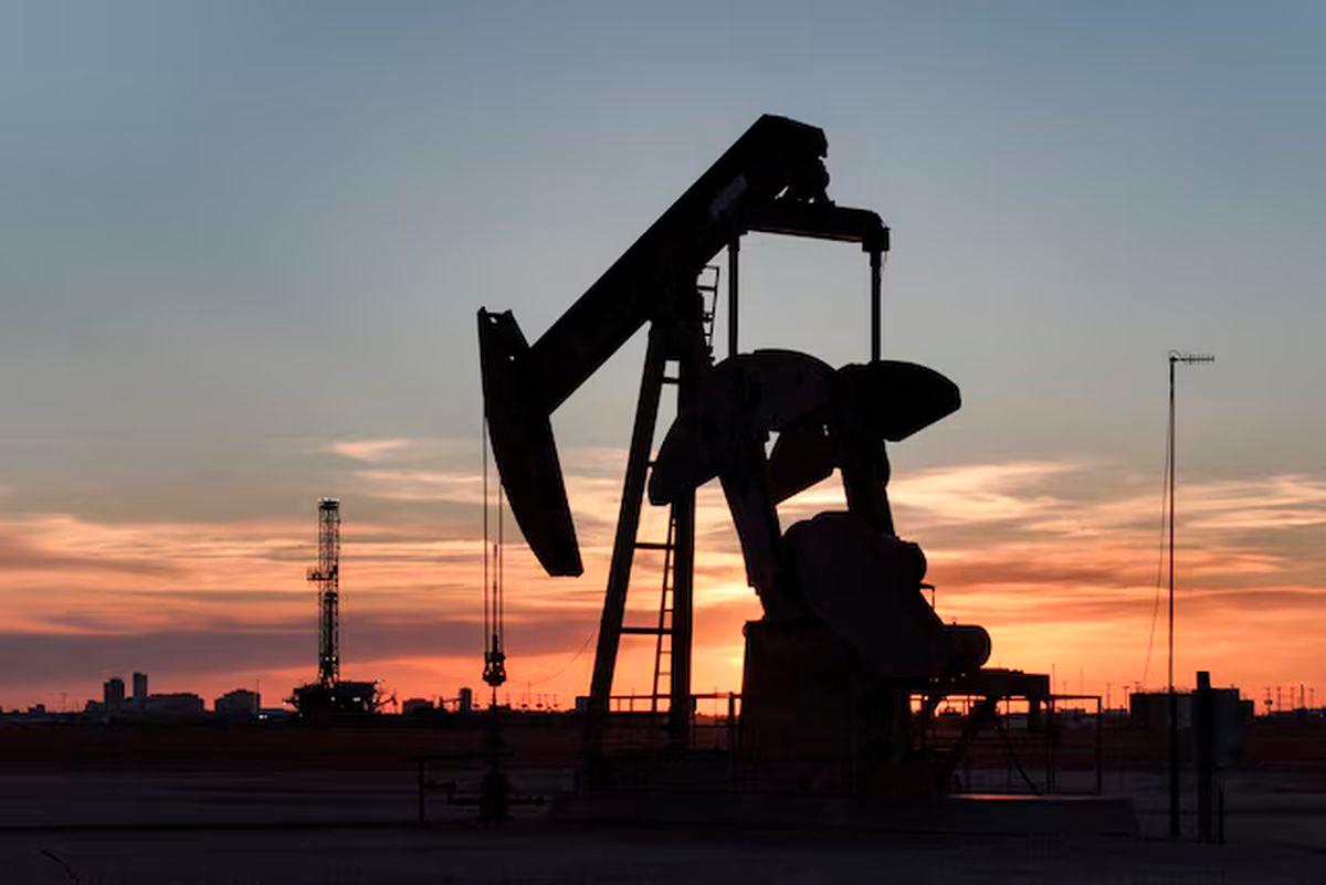 A drone view of a pump jack and drilling rig south of Midland, Texas, U.S. June 11, 2025. - REUTERS/Eli Hartman/ File Photo