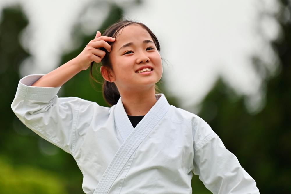 This photo taken on June 23, 2019 shows young Japanese karate competitor Mahiro Takano training in Nagaoka, Niigata Prefecture. — AFP