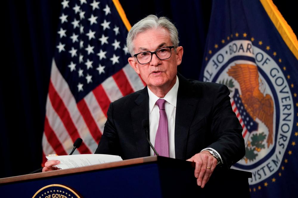 Powell speaking at a news conference following a two-day meeting of the Federal Open Market Committee in Washington yesterday. – Reuterspix