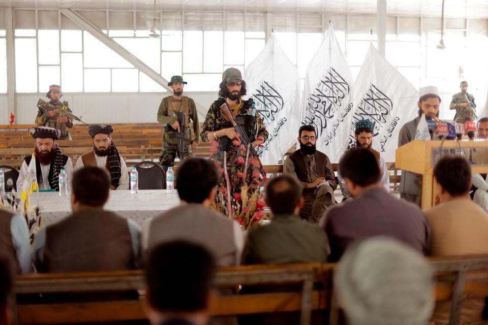 Afghanistan Taliban officials pray before the start of a news conference where they announced they will start issuing passports to its citizens again following months of delays that hampered attempts by those trying to flee the country after the Taliban seized control, in Kabul, Afghanistan October 5, 2021. -REUTERSPix