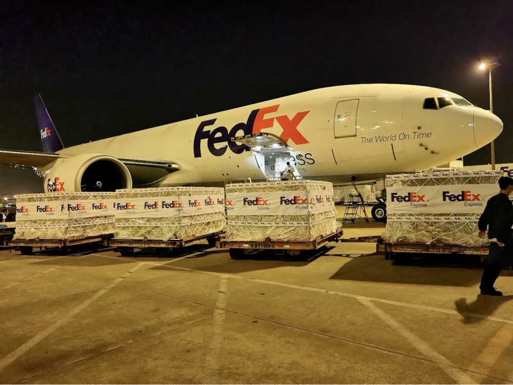 Oxygen concentrators are loaded onto FedEx plane for delivery to India. -FedEx