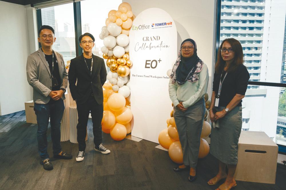 At the collaboration ceremony are (from left) EzyOffice operation director Dominic Khoo, Teo, Noorbaizura and Tower REIT leasing manager Zarina Adnan.
