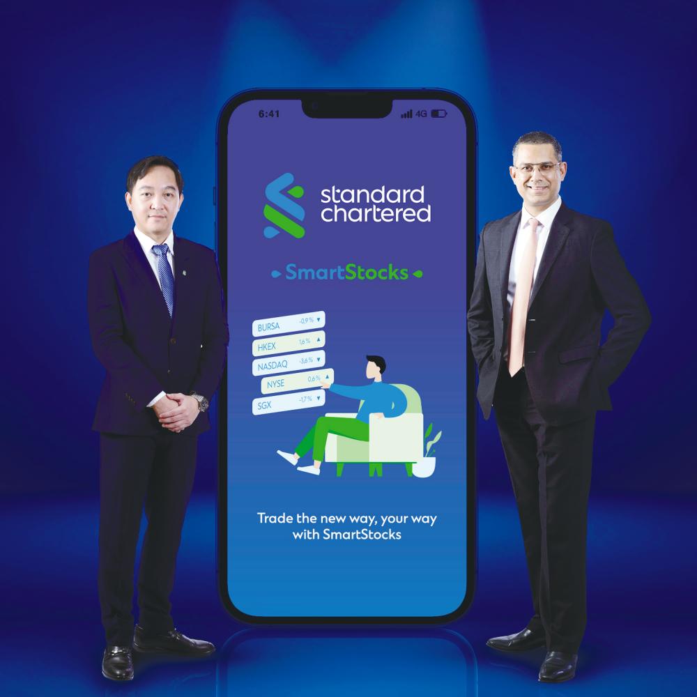 Standard Chartered Malaysia head of affluent and wealth management Nicholas Soon (left) and Sammeer at the launch of SmartStocks.