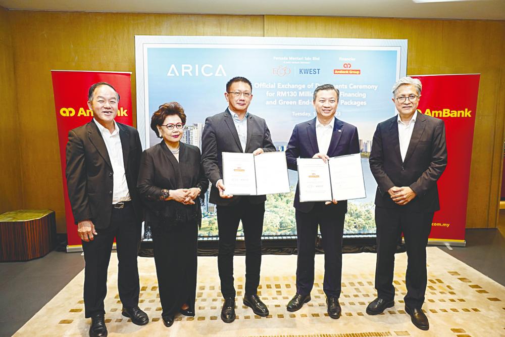From left: Tee, Eastern &amp; Oriental executive chairman Datuk Maznah Abdul Jalil, KWEST chairman Michael Tan, Yap and Sulaiman at the signing ceremony.