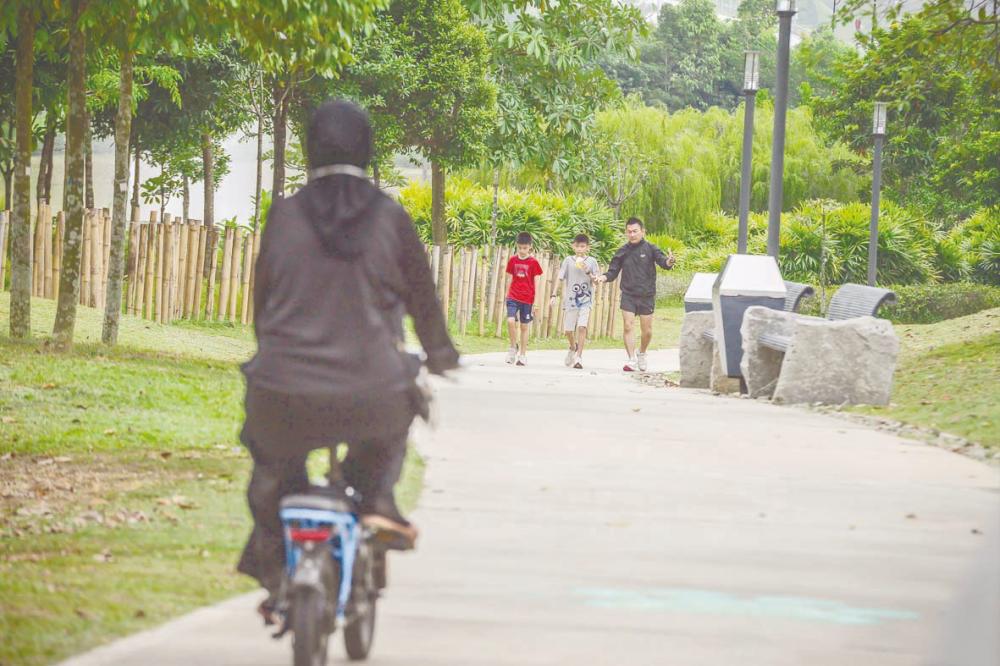 Parks offer an ideal environment for people of all ages to relax, stretch out and engage in light activities.– ADIB RAWI YAHYA/ THESUN