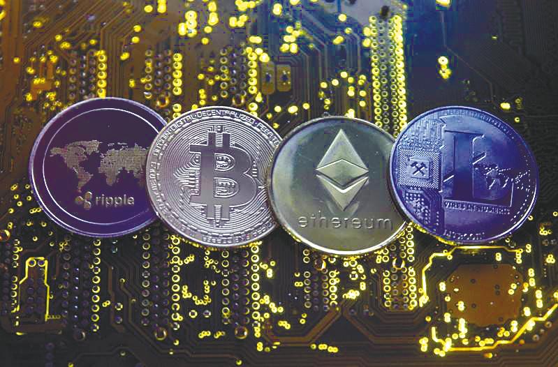 Representations of Ripple, Bitcoin, Etherum and Litecoin are seen on a PC motherboard in this illustration picture. Luno Malaysia says its customers mainly regard cryptos as an investment vehicle to diversify their portfolios. – REUTERSPIX