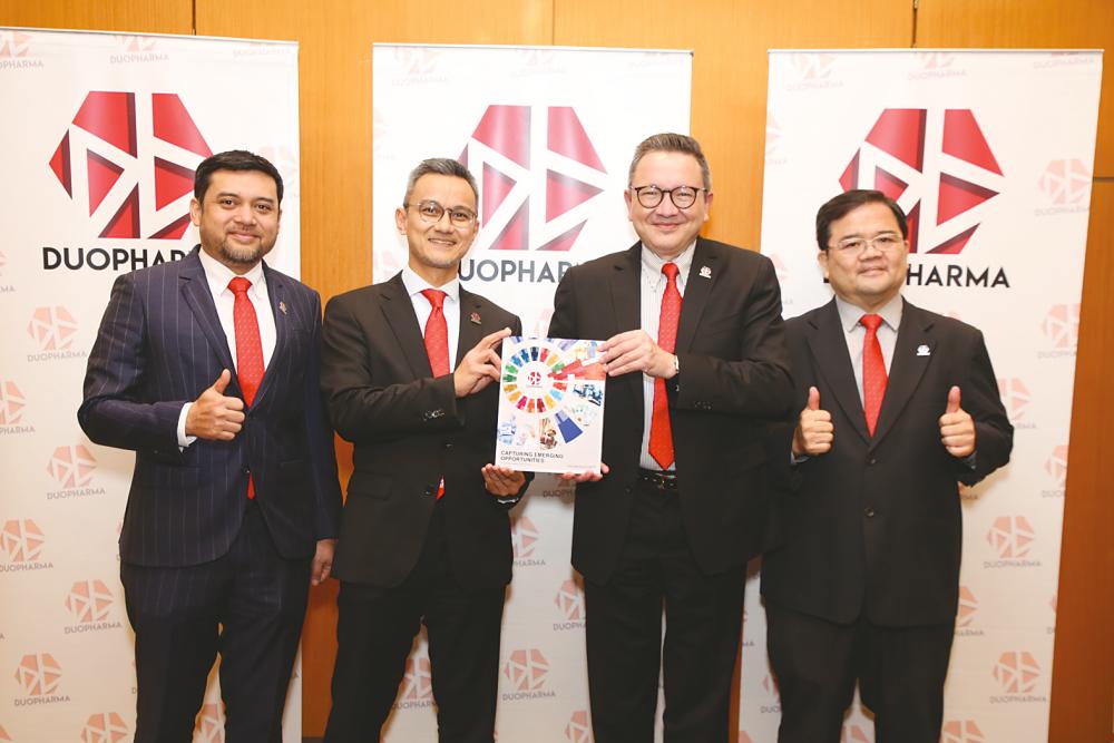 From left: Duopharma Biotech corporate CEO Datuk Dr Anas Alam Faizli, commercial CEO Wan Amir-Jeffery Wan Abdul Majid, Leonard Ariff and CFO Chek Wu Kong at the event.