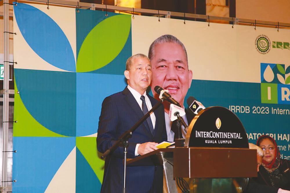 Fadillah delivering his address at the rubber conference.