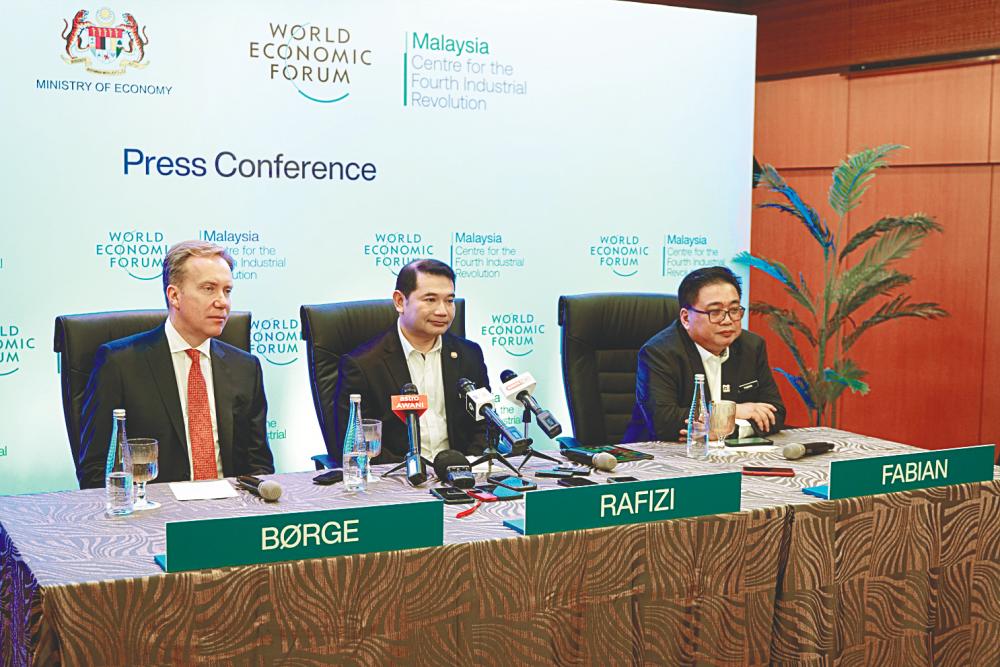 From left: Brende, Rafizi and Fabian at the launch.