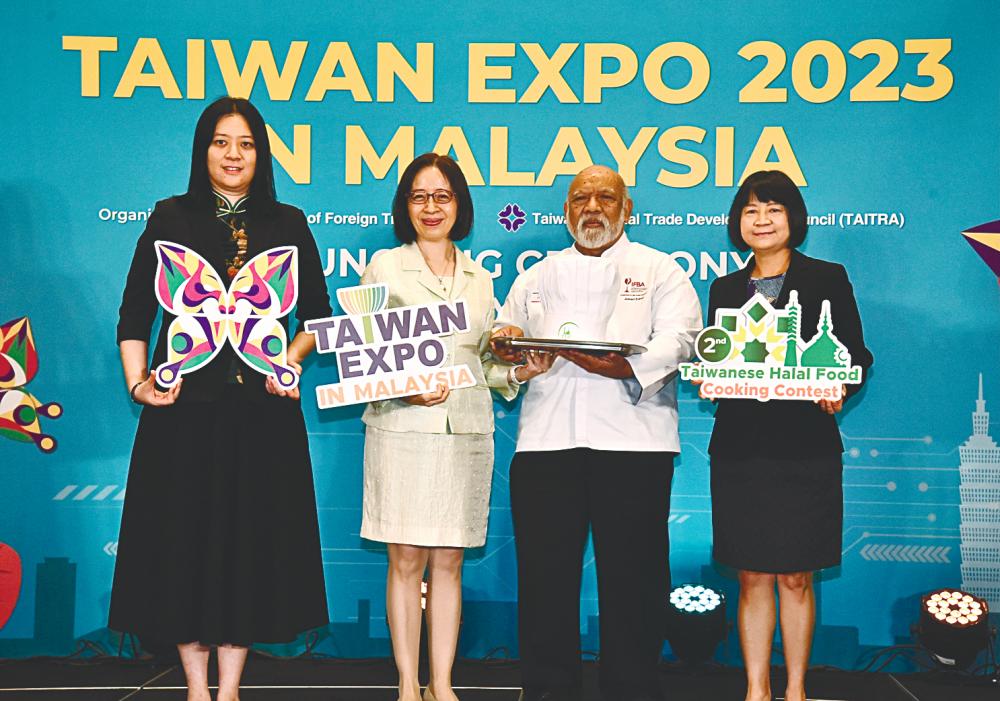 From left: Taiwan trade centre Kuala Lumpur director Eva Peng, Yeh, and celebrity chef Johari Edrus, and Chen holding the Taiwan Expo 2023 placard at the launch. – Muhamad Syazwan/thesun