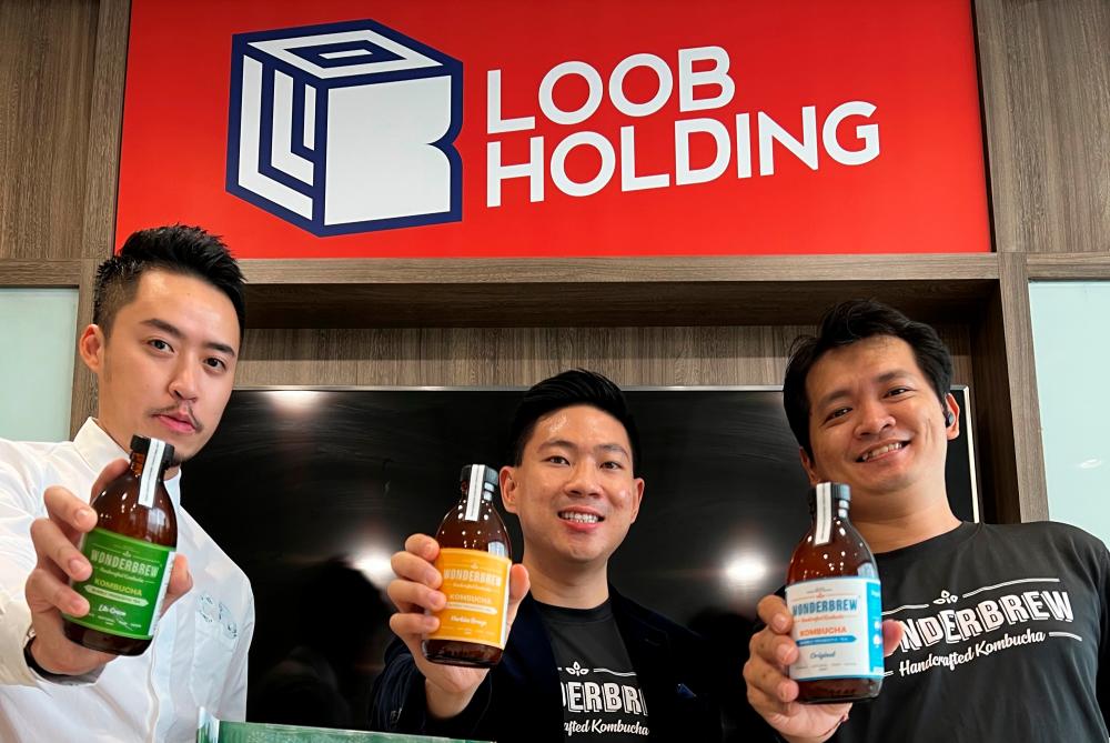 Loo (left) and WonderBrew founders Poh and Loke Boon Eng.