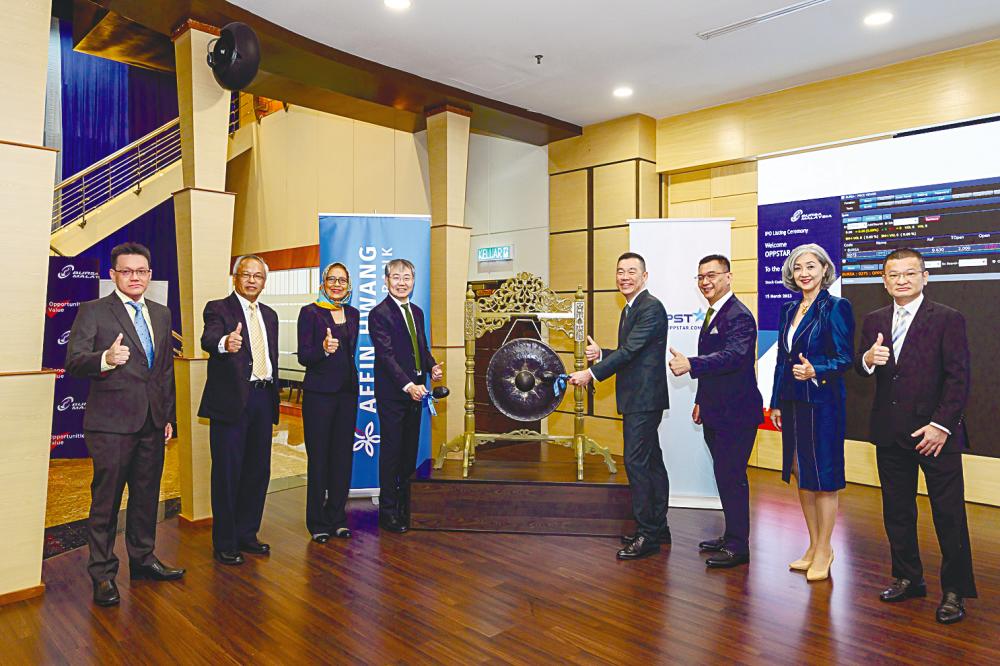 From left: Oppstar Bhd CFO Chin Fung Wei, director Datuk Dr Mohd Sofi Osman, chairman Professor Datuk Dr Siti Hamisah Tapsir, Ng, executive director and chief technology officer Cheah Hun Wah, executive director and chief operating officer Tan Chun Chiat, directors Datuk Margaret Yeo and Foong Pak Chee at the listing ceremony.