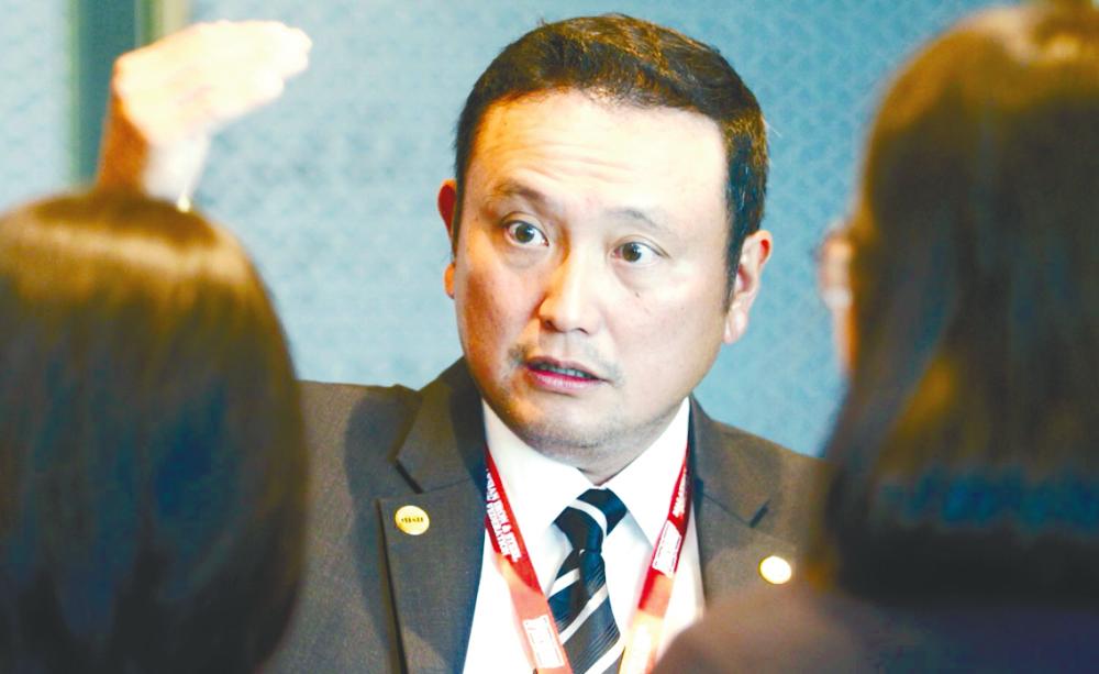 Lim speaking to reporters on the sidelines of the forum. – ZULKIFLI ERSAL/THESUN