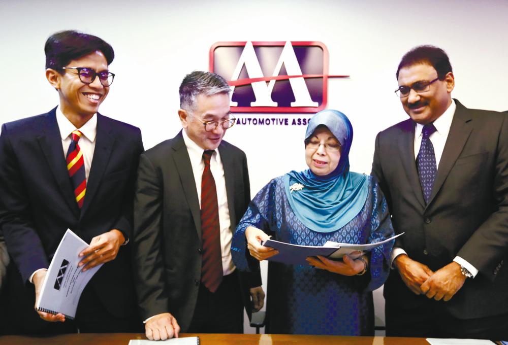 From left: Malaysia Automotive Association vice-president (manufacturing), Sarly Adle Sarkum, vice-president (policy &amp; regulations) Tan Keng Meng, Aishah and vice-president (trade) Ravindran Kurusamy after the review and outlook briefing today. – ASYRAF SHAMSULTHE SUN