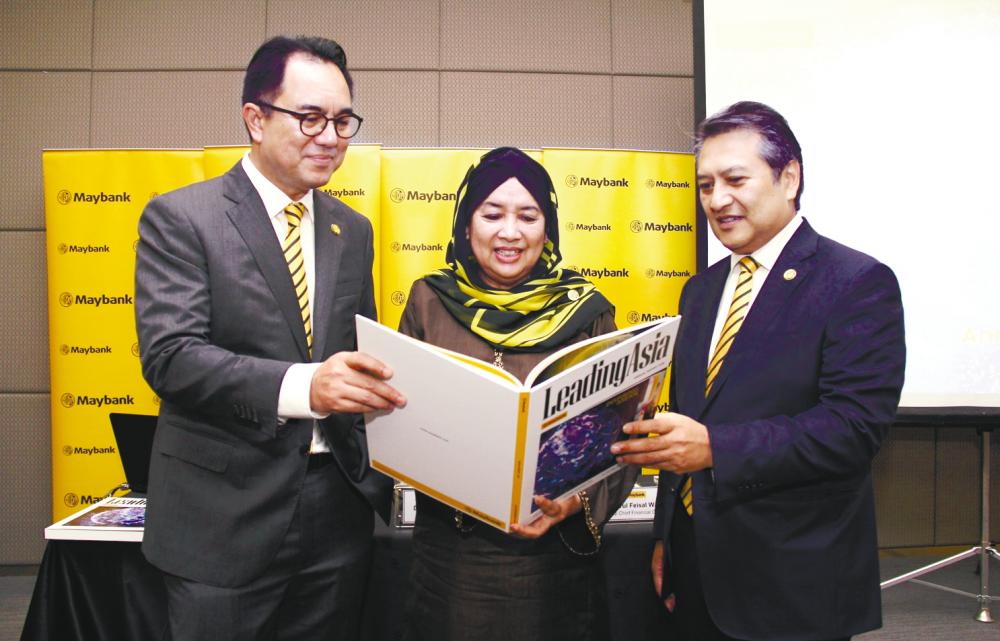 From left: Farid, Maybank chairman Datuk Mohaiyani Shamsudin and Amirul Feisal at the press conference after the AGM today.