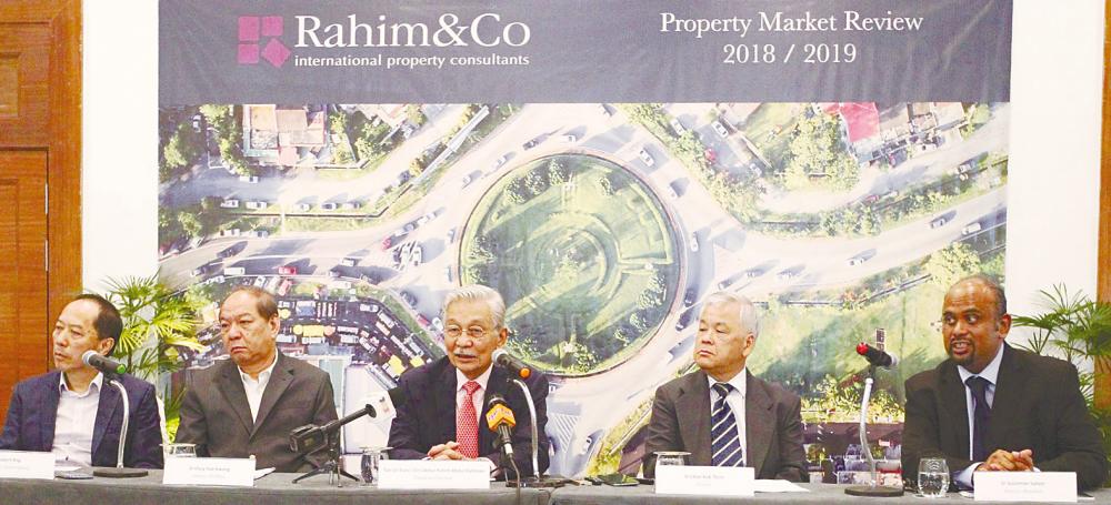 From left: Rahim &amp; Co director of estate agency Robert Ang, director Choy Yue Kwong, Abdul Rahim, director Chee Kok Thim and Sulaiman at the briefing on the Malaysian property market yesterday. – Zulkifli Ersal/theSun