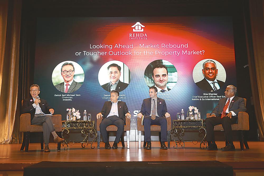 From left: Invest KL chairman Datuk Seri Michael Yam Kong Choy, GE Malaysia CEO Datuk Mark Rozario, Record and Siva during a panel discussion at the conference yesterday. – ASYRAF RASID/THESUN