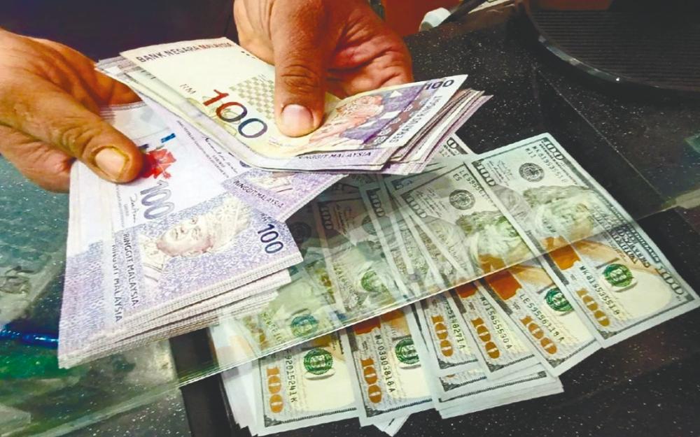 The ringgit is likely to trade around the current level of between 4.40 and 4.41 versus the US dollar this week, – Bernamapix