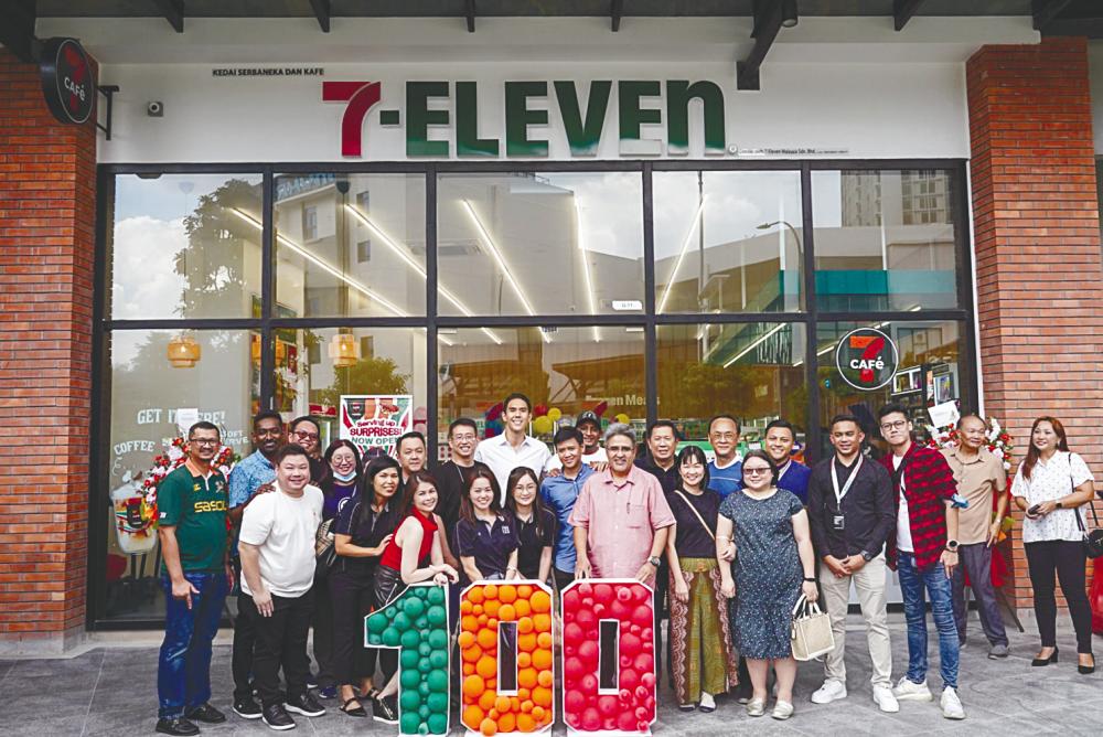 The management and team during the launch of 7-Eleven’s 100th 7CAFe store at Bukit Jalil Tropika.