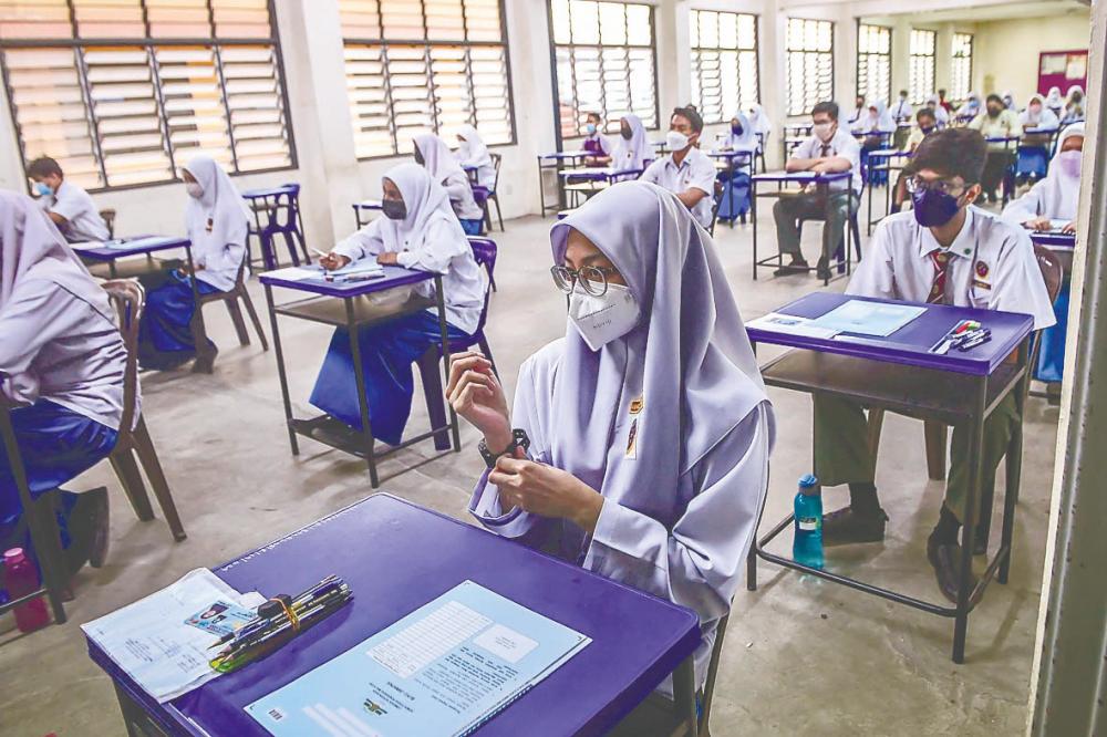 Centralised exams provide standardised metrics across schools, allowing a fair comparison of students’ abilities. – ADIB RAWI YAHYA/THESUN