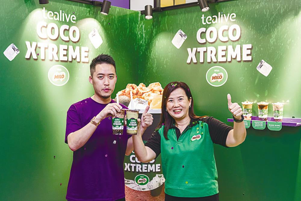 Loo (left) and Yit at the launch of Tealive’s Coco Xtreme with Milo series.