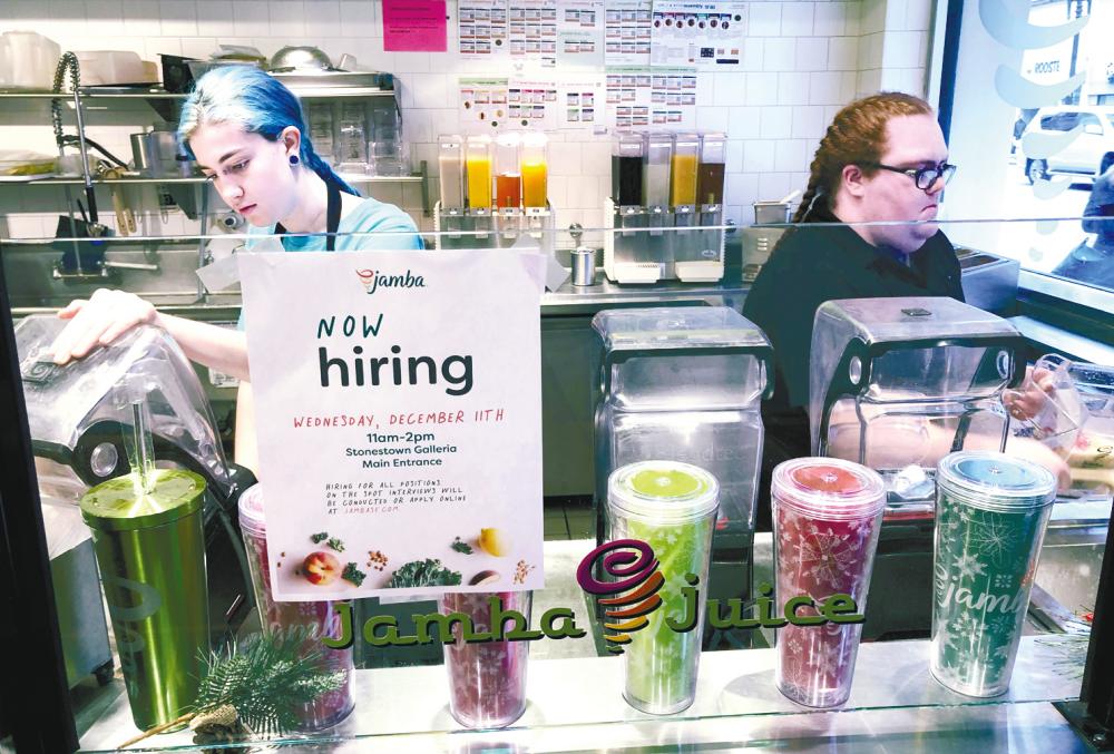 A sign at a Jamba Juice outlet in San Francisco, California, on Friday.. The US job market added 266,000 jobs in November, beating analyst expectations of 180,000 and the unemployment rate fell to a 50 year low of 3.5%. – AFPPIX
