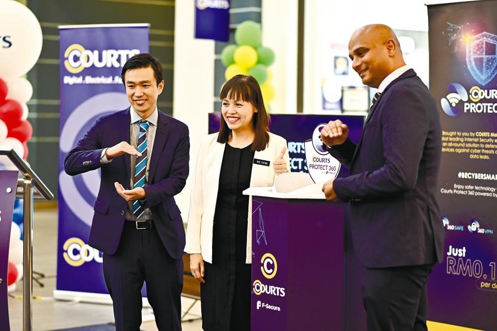 From left: Higashiura, Teo and Renukanand at the launch of Protect 360 recently.